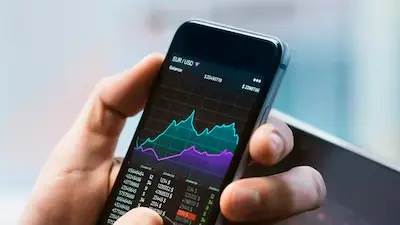 Ex-Banker Sparks Debate On Costly Trading Apps