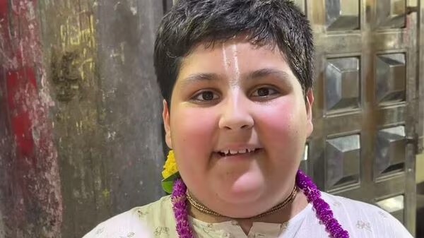Divine Dior: 10-Year-Old 'Bal Sant' Sparks Debate at Mahakumbh 2025