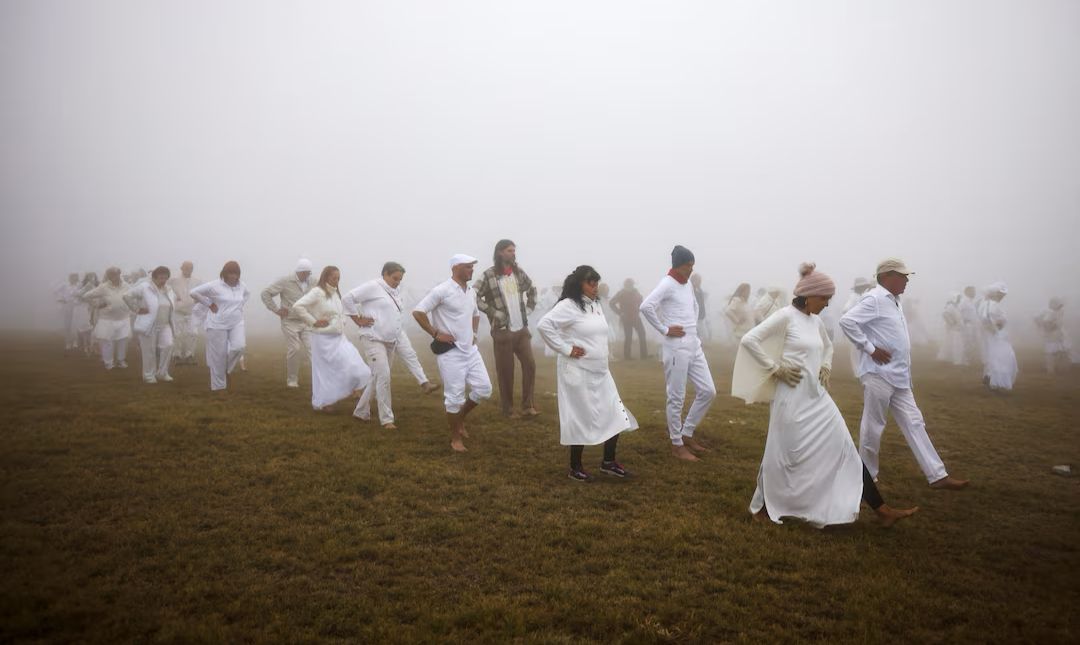 Ringing in the Divine: Hundreds Make a Splash for New Year Near Bulgaria’s Mountain Lake